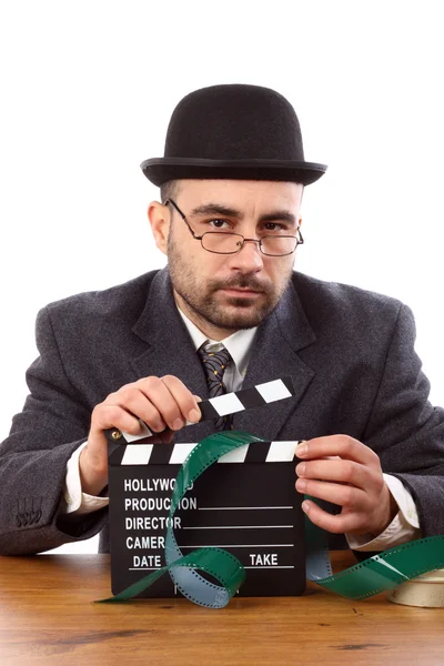 Mann hält Filmklappe in der Hand — Stockfoto
