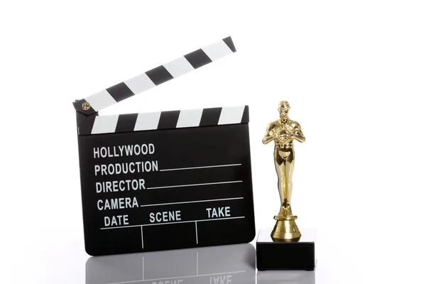 Movie clapper board and Oscar — Stock Photo, Image