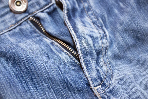 Structure of a dark blue jeans fabric — Stock Photo, Image