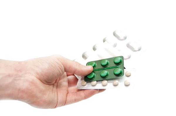 Doktorun elinde farklı tabletleri — Stok fotoğraf