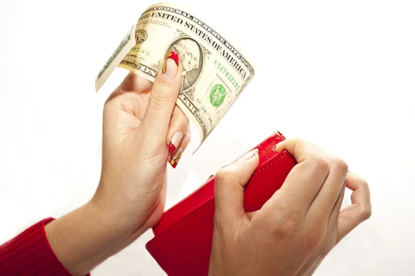Rote Geldbörse in der Hand mit Dollar — Stockfoto