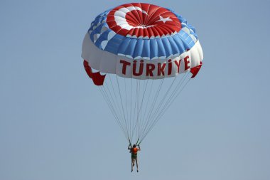 The tourist on a parachute clipart