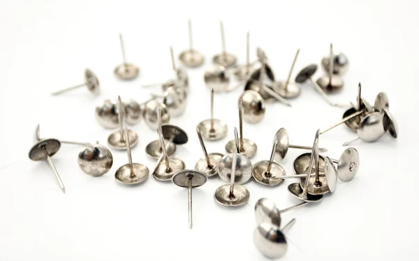 Scattered nails with hats — Stock Photo, Image