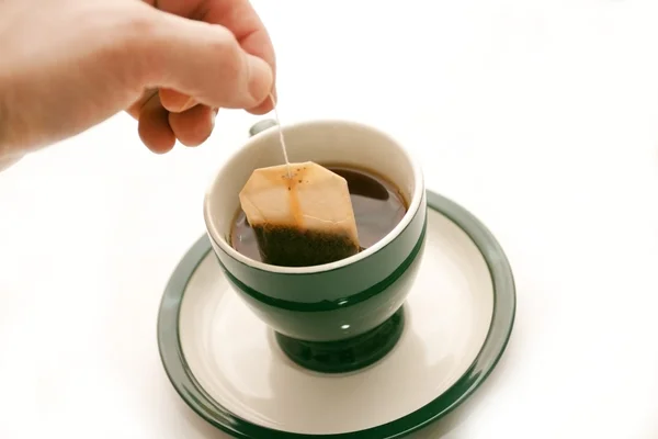 Aan te dringen voor een zak van thee — Stockfoto