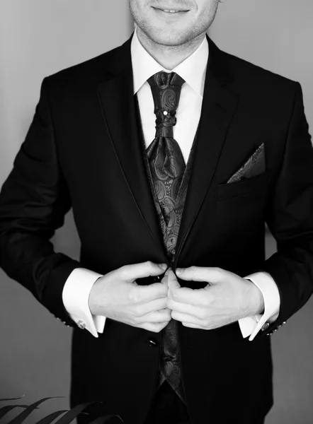Groom in a wedding jacket and tie, black and white — Stock Photo, Image