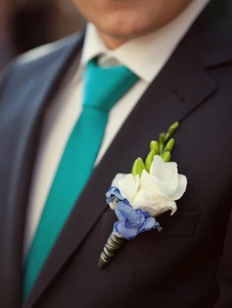 Groom in a wedding jacket with boutonniere — Stock Photo, Image