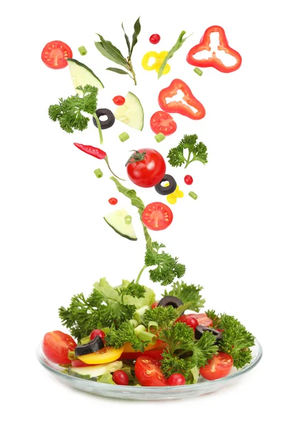 Fresh salad and falling vegetables — Stock Photo, Image