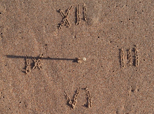 stock image Sun clock on sand