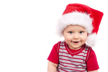 Adorable christmas child in a red hat clipart