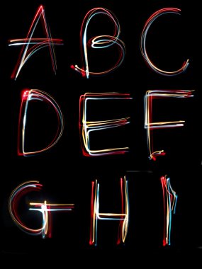 Alphabet light neon writing long exposure clipart