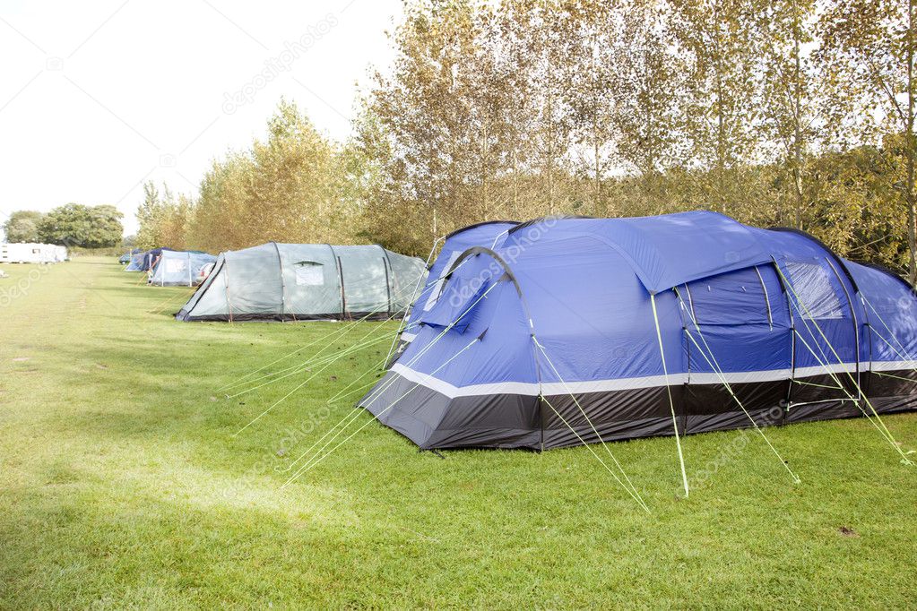 Tents in a row on a campsite