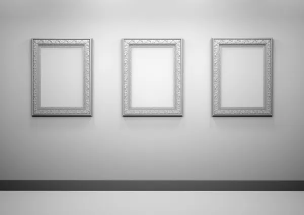 Galerieinnenraum mit leeren Rahmen an der Wand — Stockfoto