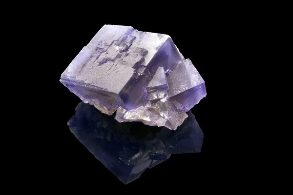 Fluorite crystal over a black background — Stock Photo, Image