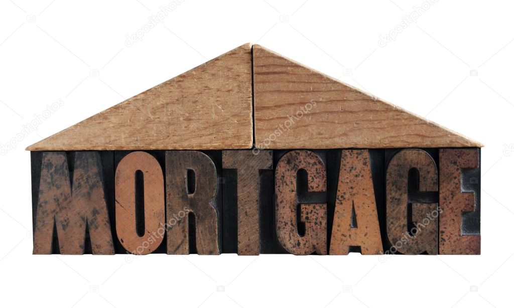 Mortgage word with roof made of blocks