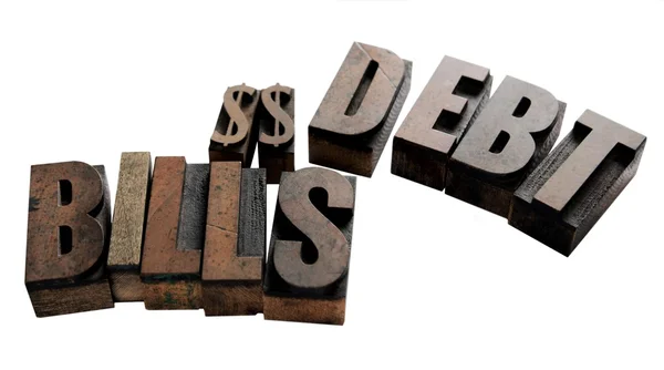 A dollár jeleket adósság és a számlák szavak — Stock Fotó