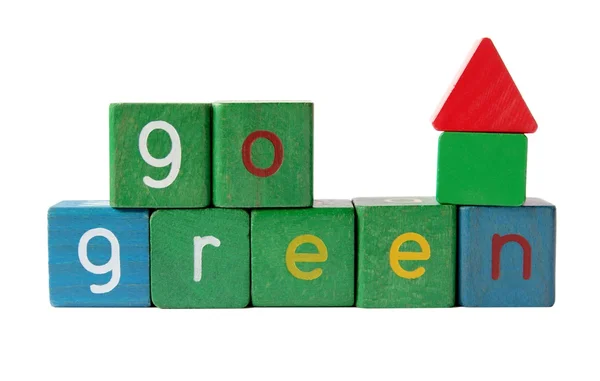 De woorden 'go green' met blok huis — Stockfoto