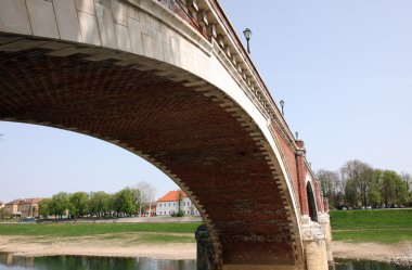 The bridge over the Kupa at Sisak, Croatia clipart