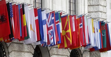 International flags at the Hofburg in Vienna clipart