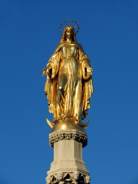 Virgin Mary statue made of gold clipart