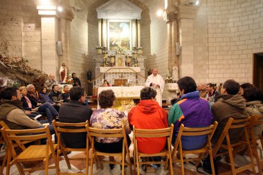 The Church of Jesus' first miracle. Couples from all over the world come to renew their wedding vows, Cana clipart