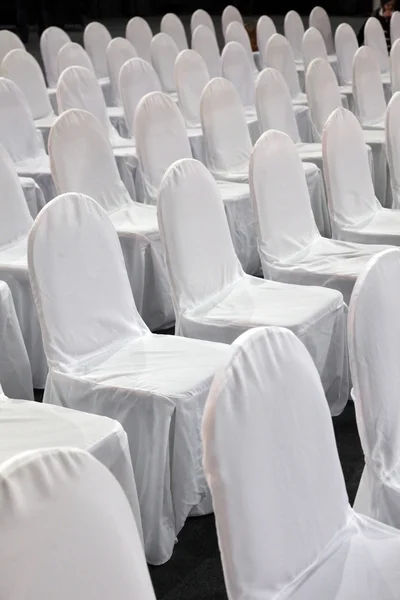 Rows of white chairs — Stock Photo, Image