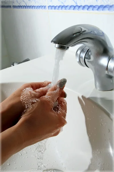 Washing hands in bathroom — Stock Photo, Image