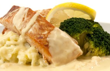 Salmon with mashed potatoes and cream shrimp sauce clipart