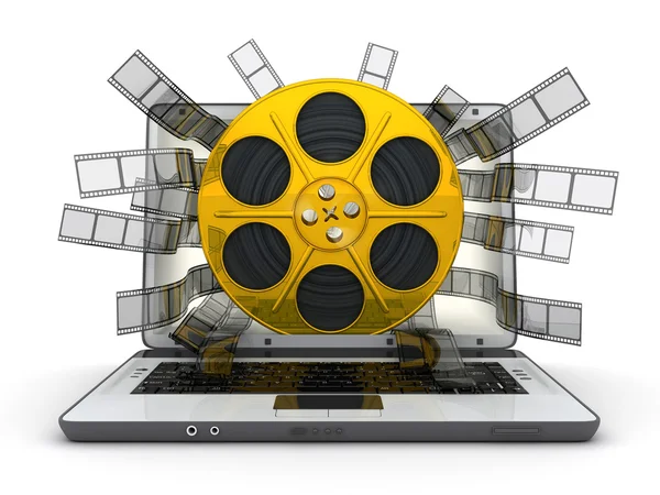 Laptop and gold spool — Stock Photo, Image