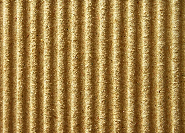 Текстура коричневой гофрированной бумаги для фона — стоковое фото