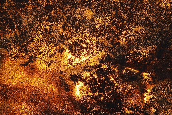 Grunge zlatý textury s pískem a světla — Stock fotografie