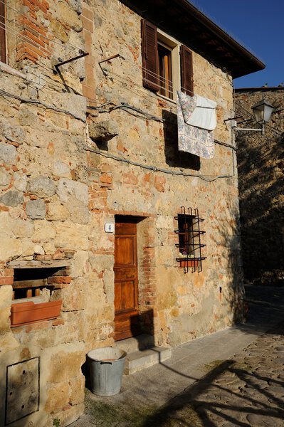 Typica house in tuscan medieval village of Monteriggioni
