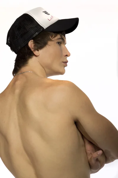 Sportif kap ile çıplak bel genç atlet — Stok fotoğraf