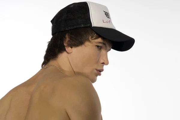 Junge Sportlerin mit sportlicher Mütze — Stockfoto