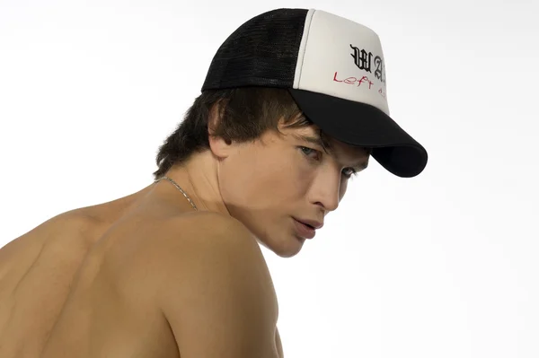Голая талия молодой спортсмен в спортивной кепке — стоковое фото