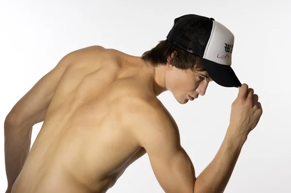 Naked waist young athlete with sporty cap — Stock Photo, Image