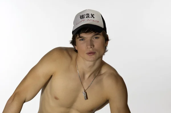 Mladý sportovec nahého pasu se sportovním uzávěrem — Stock fotografie