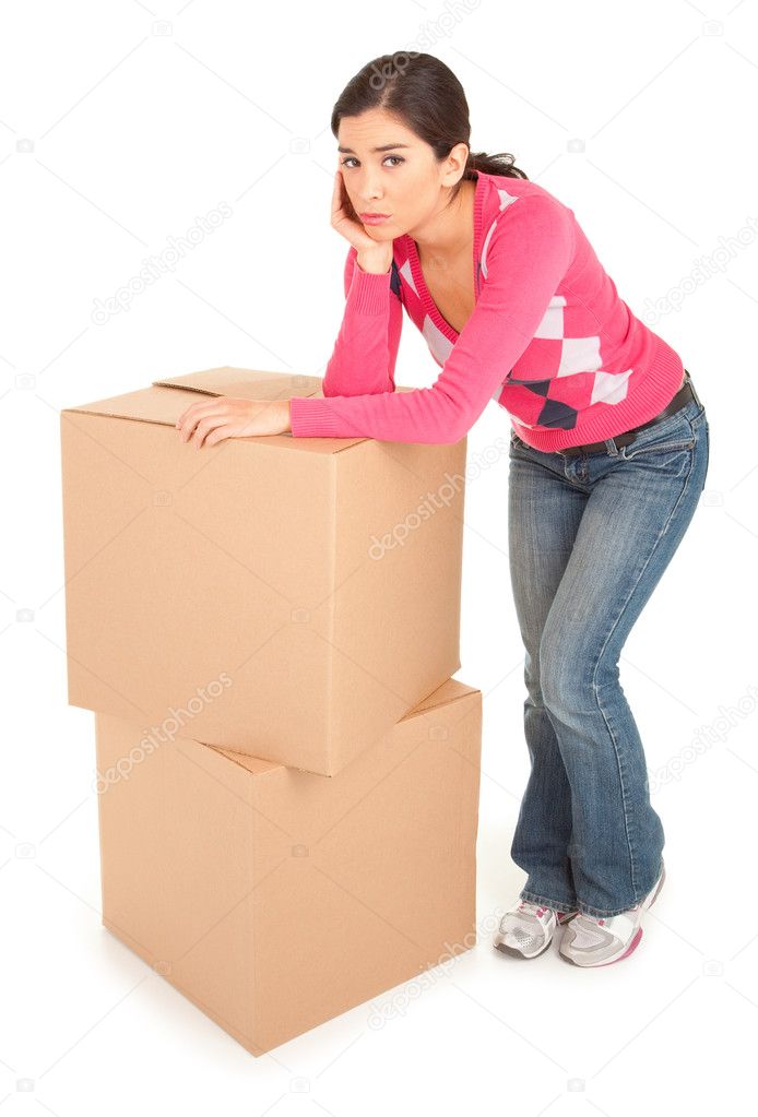 Tired Looking Woman Leaning on Boxes
