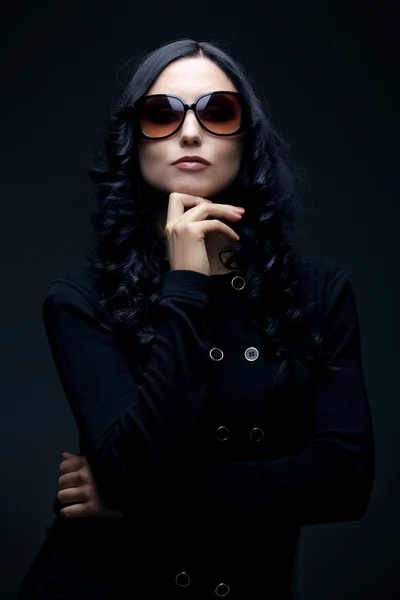 Brunette wearing sunglasses — Stock Photo, Image
