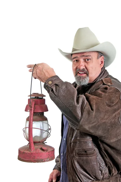 Sorridente cowboy con lanterna — Foto Stock