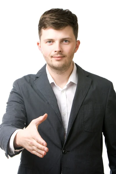 Business man giving his hand for a handshake — Stock Photo, Image