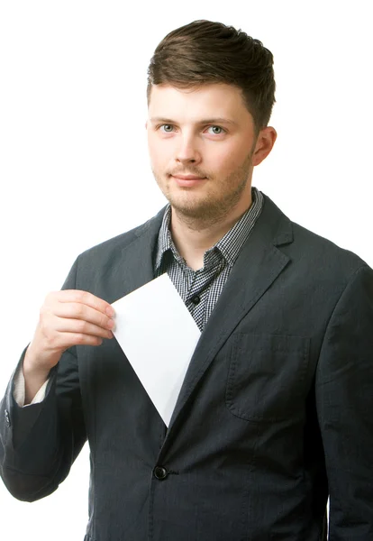 Jovem empresário segurando papel em branco — Fotografia de Stock