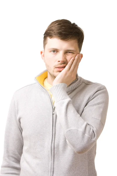 Młody człowiek cierpiący na ból zęba — Zdjęcie stockowe