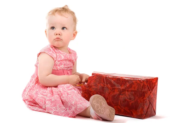 Baby girl with gift box — Stock Photo, Image