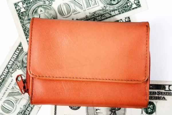 Оранжевый кожаный кошелек — стоковое фото