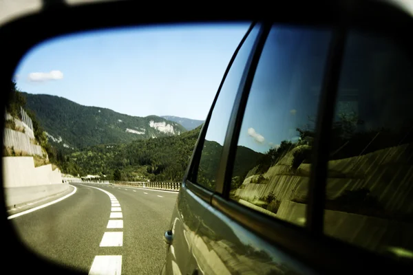 Car mirror reflection — Stock Photo, Image