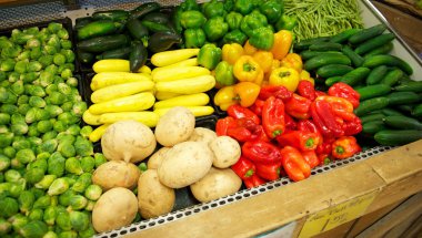 Grocery Store Bin full of brightly colored produce clipart