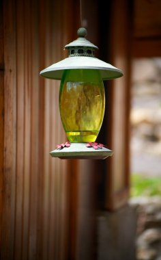 Green Metal Birdfeeder with Pink Flowers