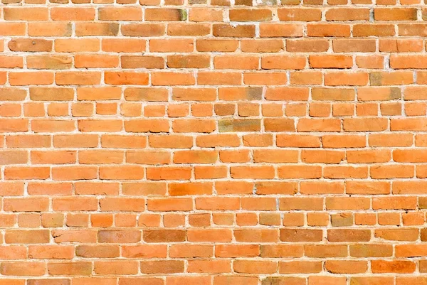 100-річний помаранчевий цегляна стіна — стокове фото