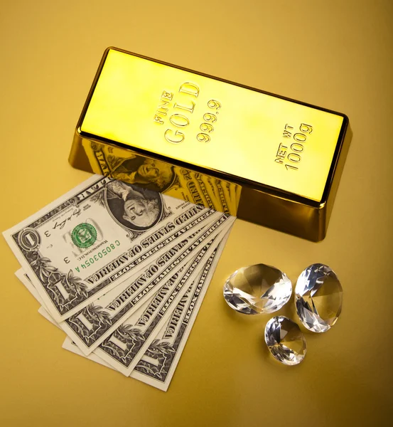 Золото и деньги — стоковое фото