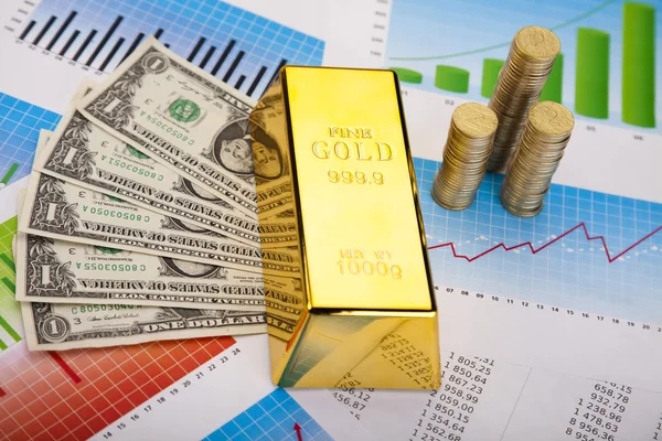 Gull og penger – stockfoto